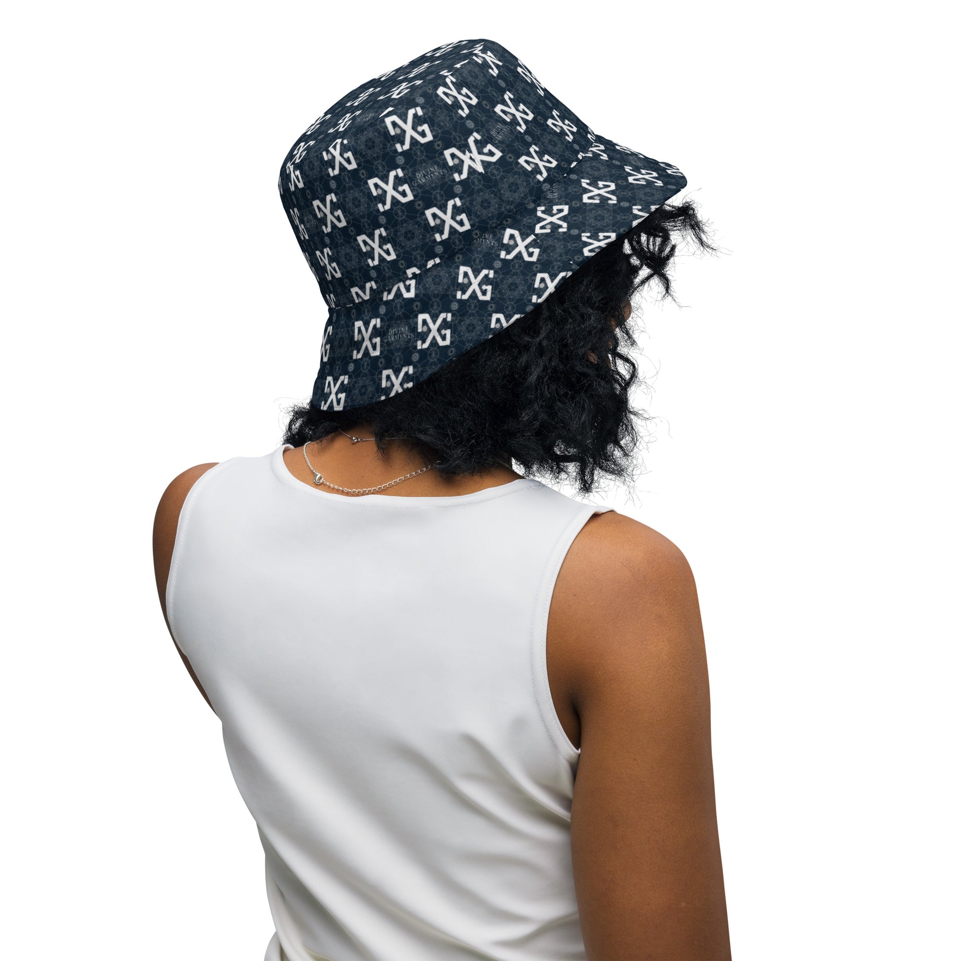 Introducing the ultimate streetwear accessory: the Divine Garments Reversible Bucket Hat! Proudly featuring the signature DG sacred geometry design, and inspired by the ancient Metatron's cube, this hat serves as a powerful symbol of protection and positive energy.