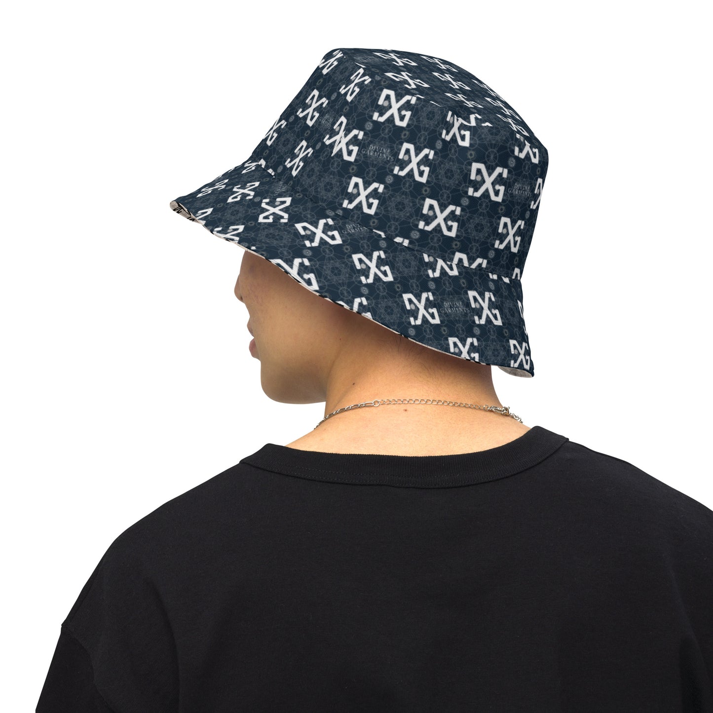 Introducing the ultimate streetwear accessory: the Divine Garments Reversible Bucket Hat! Proudly featuring the signature DG sacred geometry design, and inspired by the ancient Metatron's cube, this hat serves as a powerful symbol of protection and positive energy.