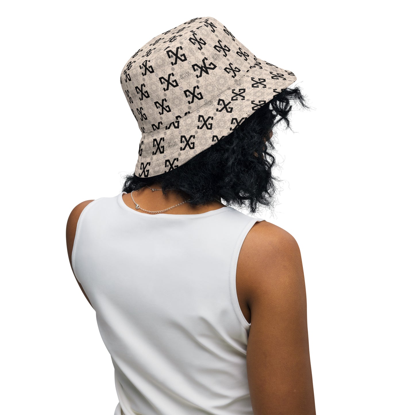 Introducing the ultimate streetwear accessory: the Divine Garments Reversible Bucket Hat! Proudly featuring the signature DG sacred geometry design, and inspired by the ancient Metatron's cube, this hat serves as a powerful symbol of protection and positive energy.