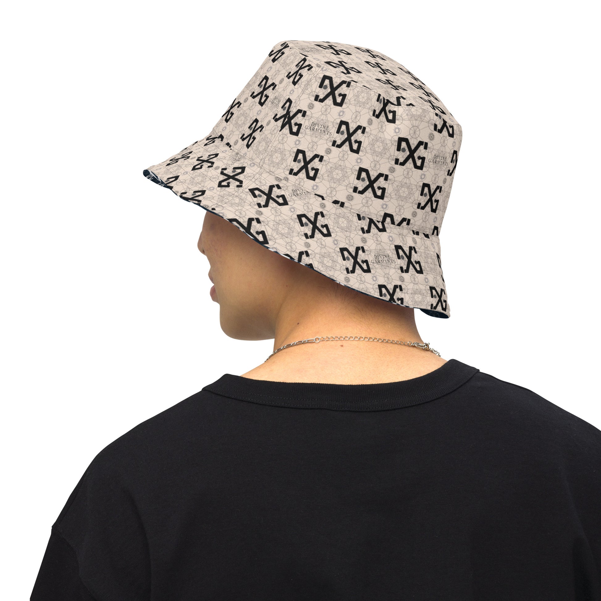 Introducing the ultimate streetwear accessory: the Divine Garments Reversible Bucket Hat! Proudly featuring the signature DG sacred geometry design, and inspired by the ancient Metatron's cube, this hat serves as a powerful symbol of protection and positive energy.