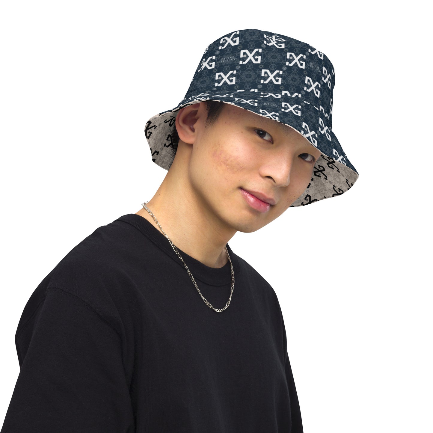 Introducing the ultimate streetwear accessory: the Divine Garments Reversible Bucket Hat! Proudly featuring the signature DG sacred geometry design, and inspired by the ancient Metatron's cube, this hat serves as a powerful symbol of protection and positive energy.