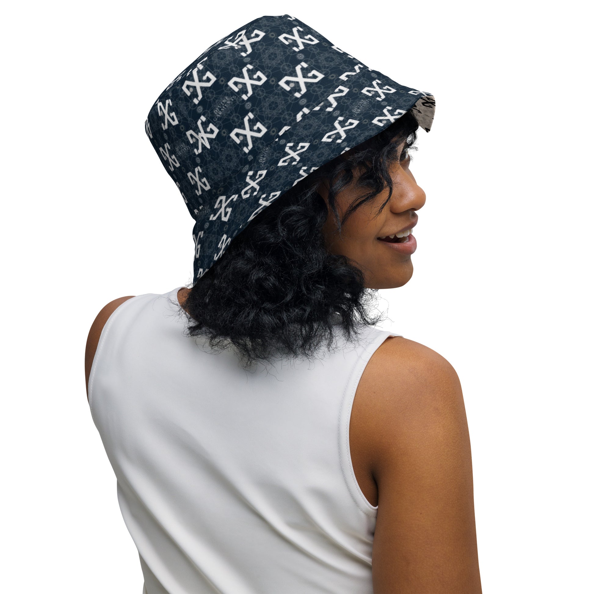 Introducing the ultimate streetwear accessory: the Divine Garments Reversible Bucket Hat! Proudly featuring the signature DG sacred geometry design, and inspired by the ancient Metatron's cube, this hat serves as a powerful symbol of protection and positive energy.