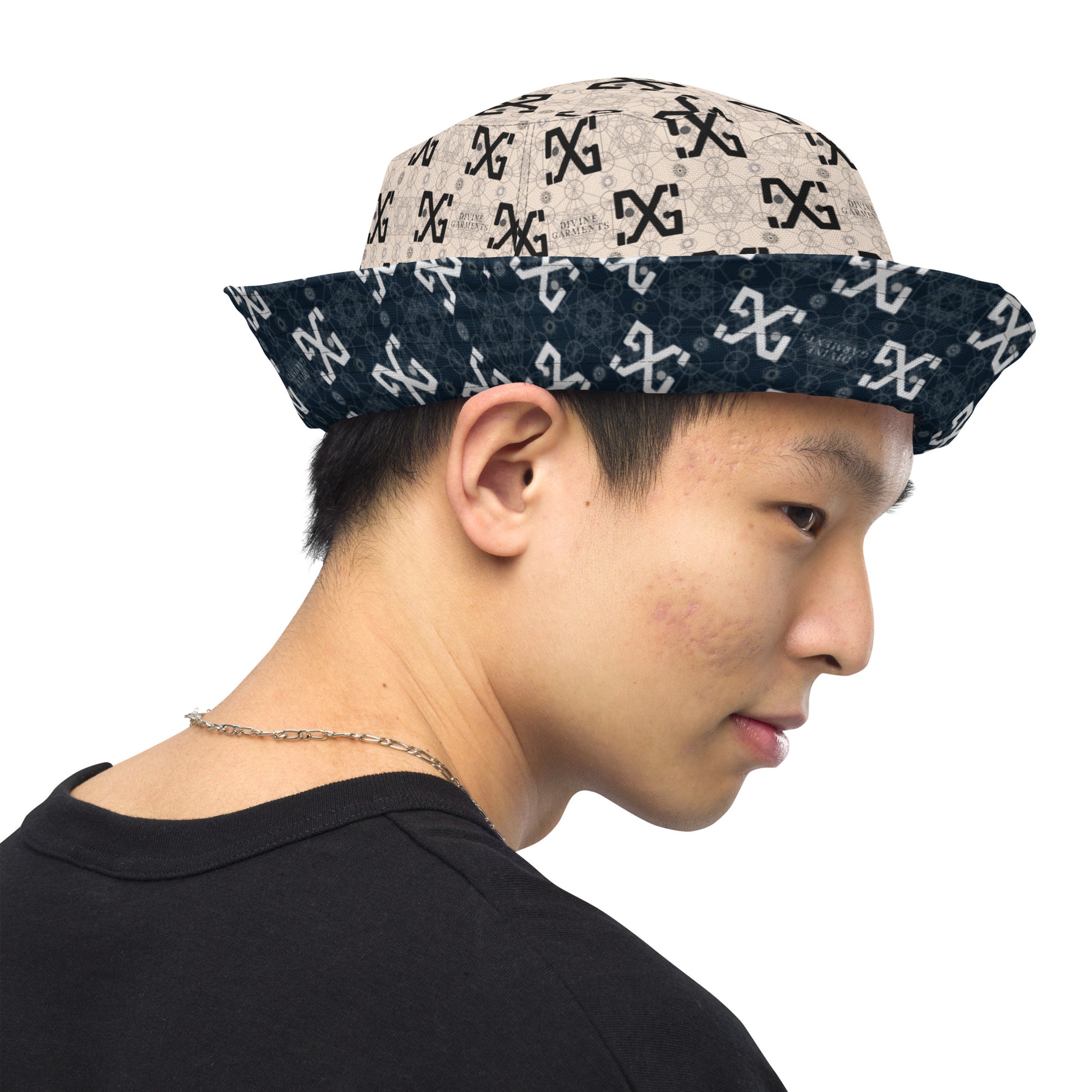 Introducing the ultimate streetwear accessory: the Divine Garments Reversible Bucket Hat! Proudly featuring the signature DG sacred geometry design, and inspired by the ancient Metatron's cube, this hat serves as a powerful symbol of protection and positive energy.