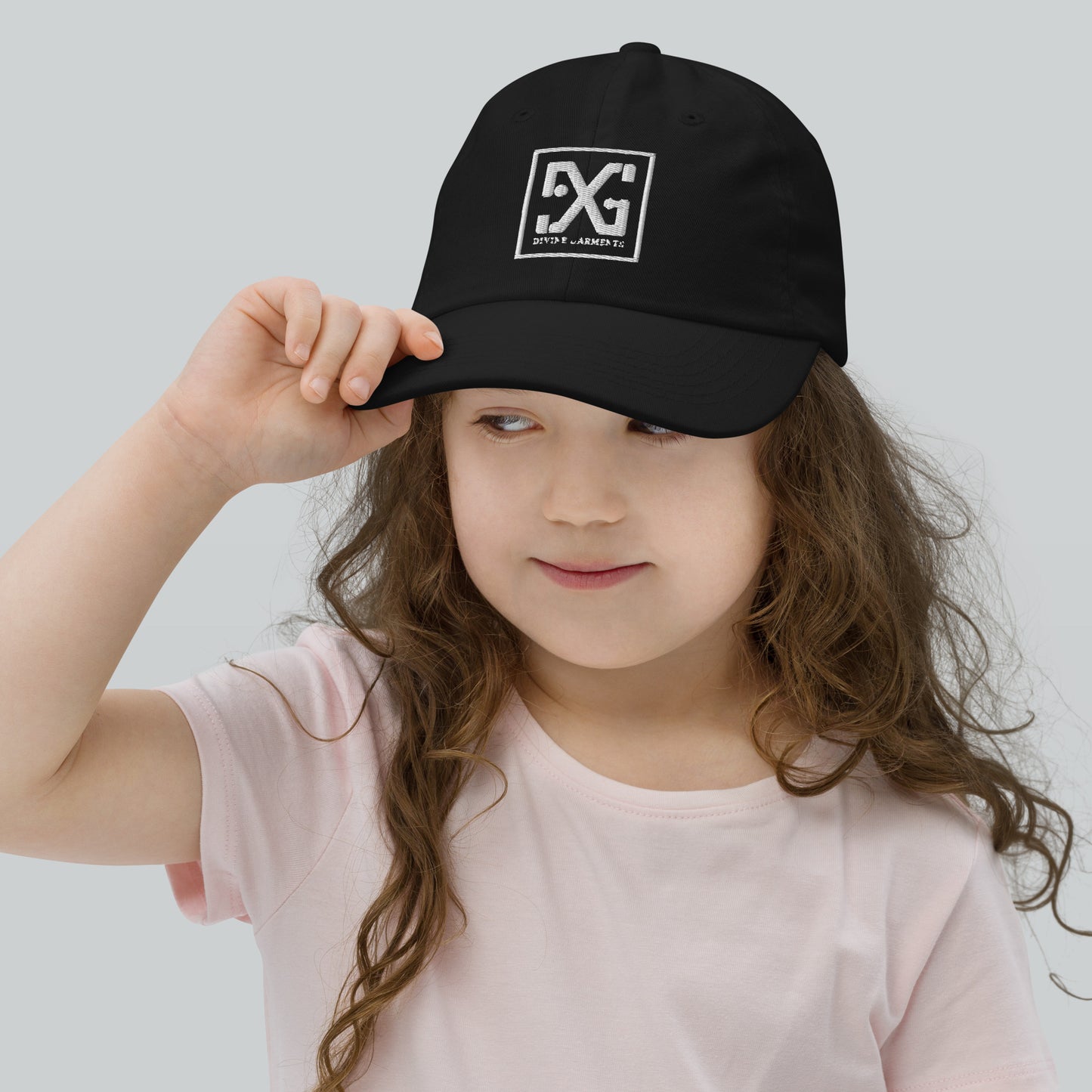 Elevate your child's style and performance with the Divine Garments Youth Cap!