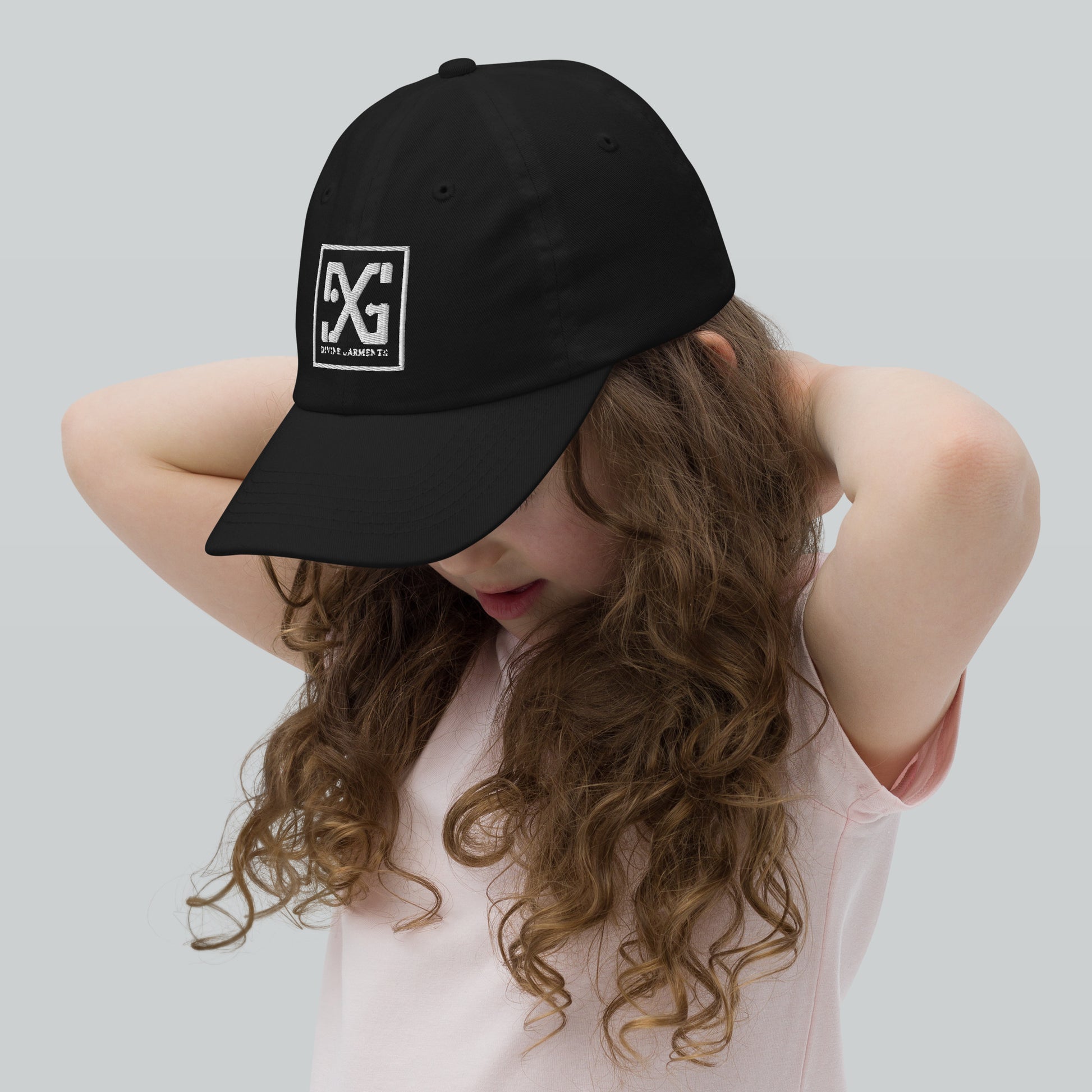 Elevate your child's style and performance with the Divine Garments Youth Cap!