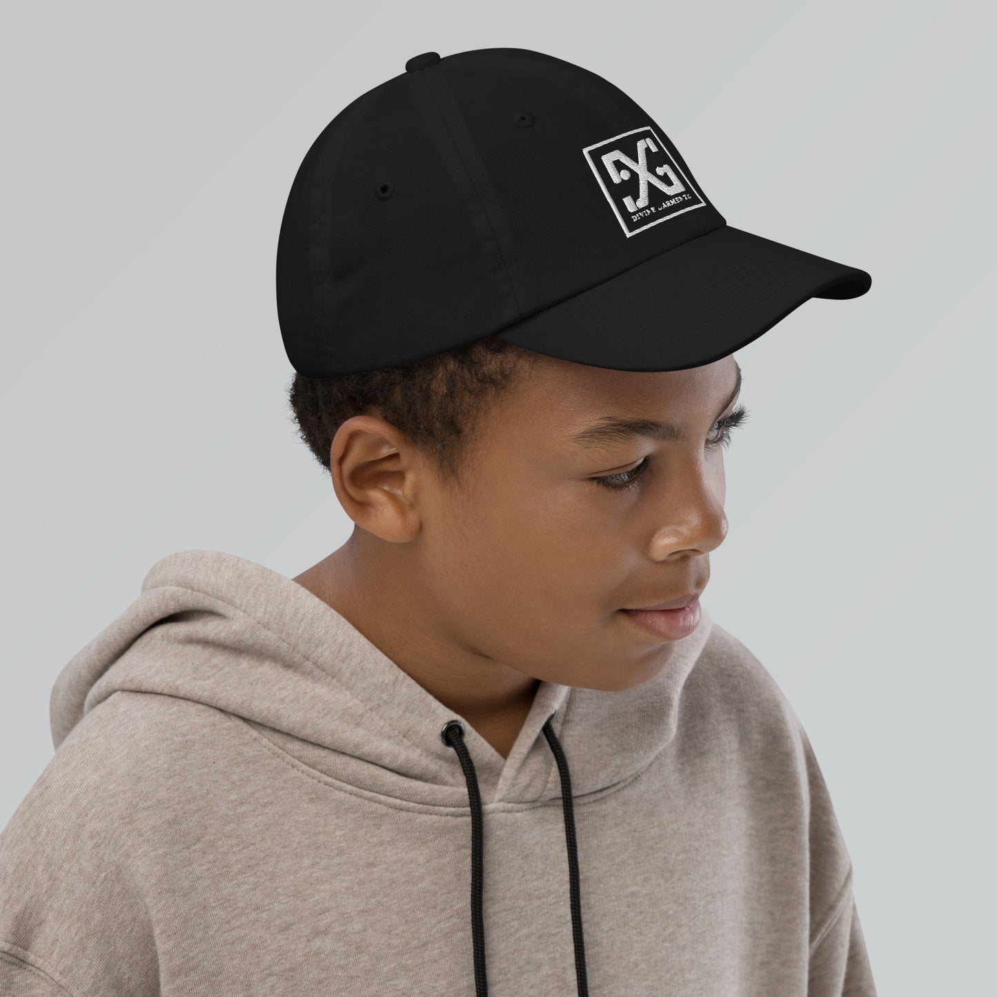 Elevate your child's style and performance with the Divine Garments Youth Cap!