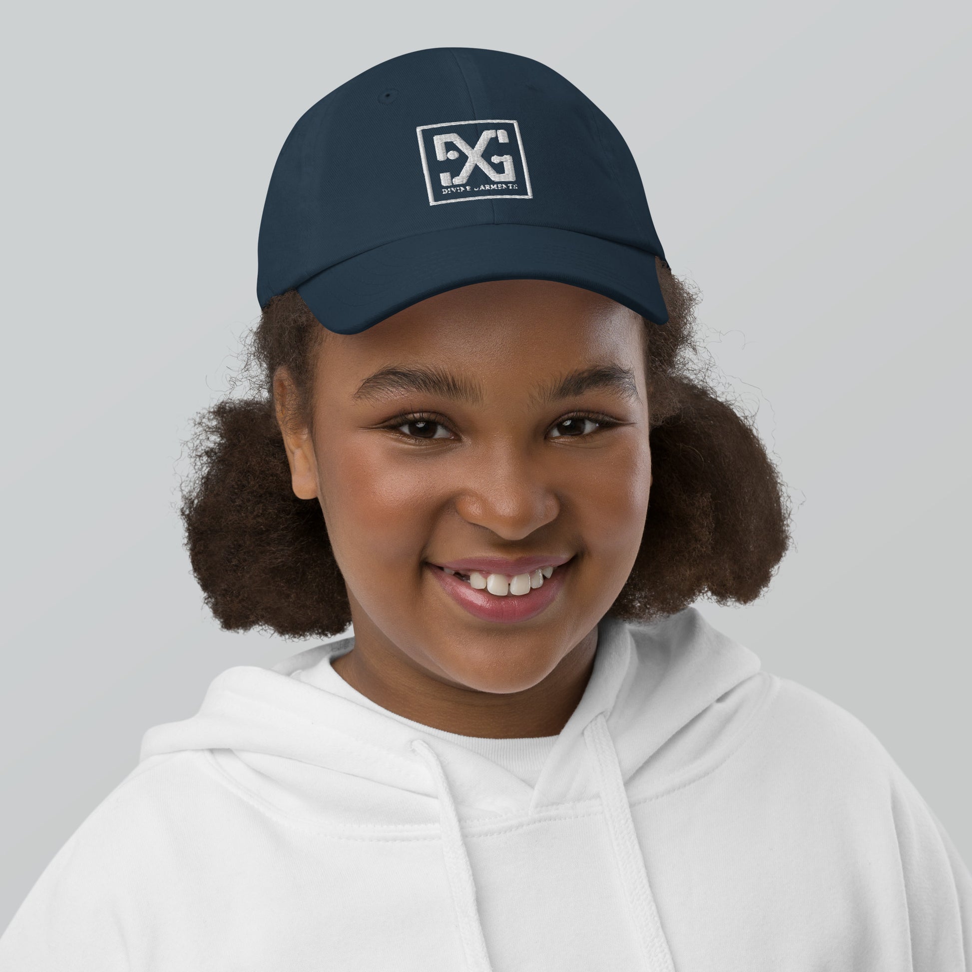 Elevate your child's style and performance with the Divine Garments Youth Cap!