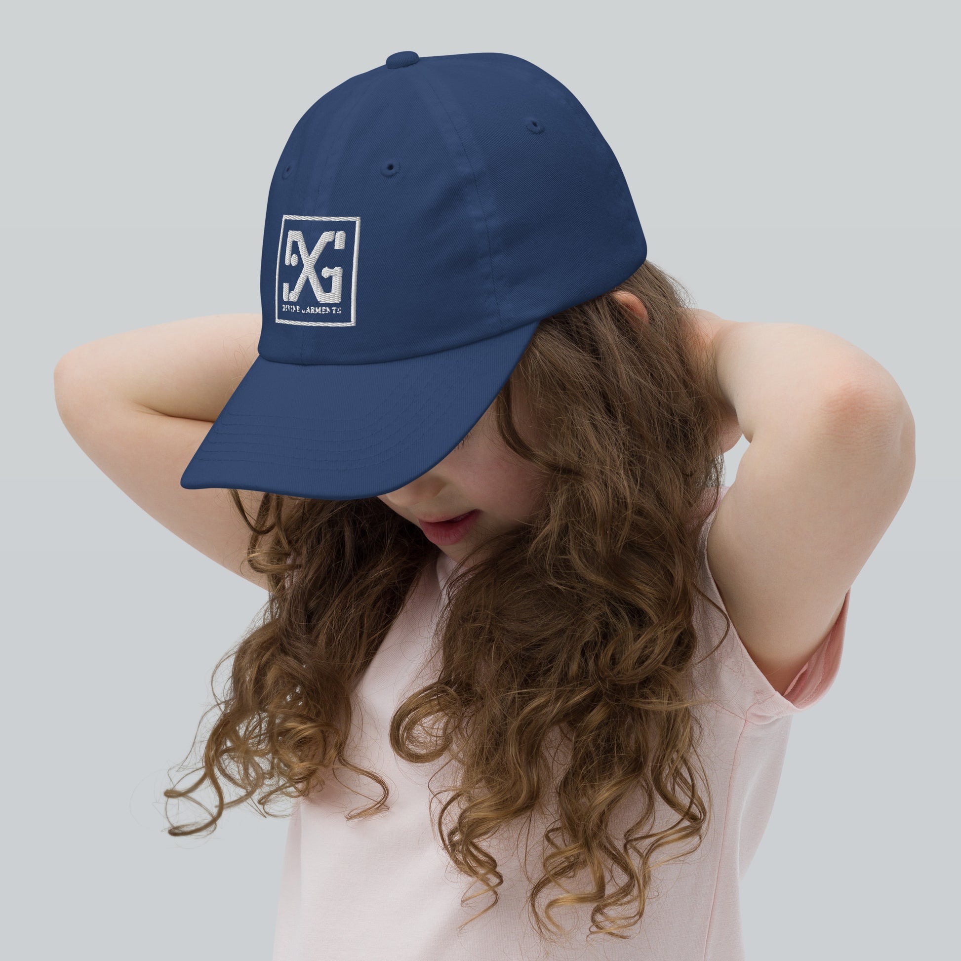 Elevate your child's style and performance with the Divine Garments Youth Cap!