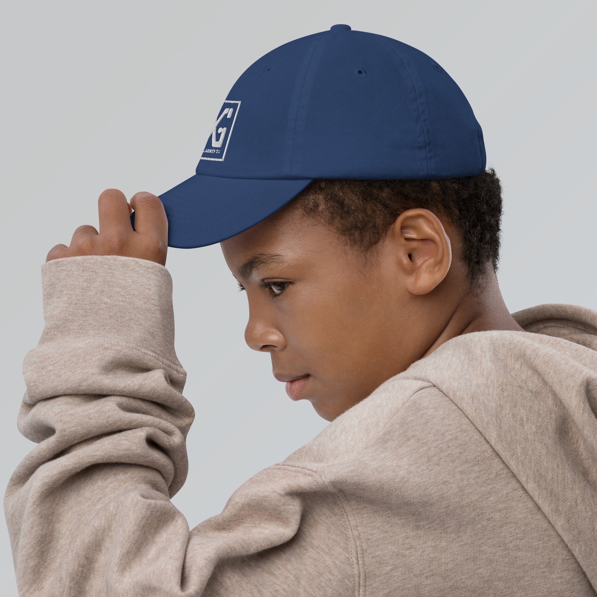 Elevate your child's style and performance with the Divine Garments Youth Cap!